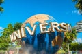 SINGAPORE - JANUARY 13 Tourists and theme park visitors taking pictures of the large rotating globe fountain in front of Universal Royalty Free Stock Photo