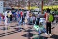 Travellers returning to their country, waiting to check in at Singapore Changi Airport Royalty Free Stock Photo