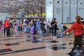 Travellers returning to their country, waiting to check in at Singapore Changi Airport Royalty Free Stock Photo