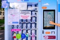 Collecting free anti-bacteria face mask from automated vending machine Ã¢â¬â STEP 1