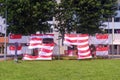 Singapore 2022Jul National flags arranged into number 57 in front of a block of HDB flats by the town council. Singapore