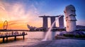 SINGAPORE-JULY 9, 2016: Merlion statue fountain in Merlion Park and Singapore city skyline at sunrise on July 9, 2016. Merlion Royalty Free Stock Photo