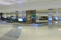 An empty arrival hall baggage carousel collection area at Terminal 1, Changi Airport; no people travellers Royalty Free Stock Photo