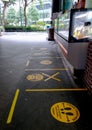 Lines and floor stickers indicating social distancing rules during covid-19 coronavirus outbreak Royalty Free Stock Photo