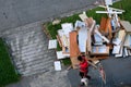 Singapore Jun2021 A pile of dismantled furniture, kitchen cabinet shelves from renovation of HDB flat is disposed on sidewalk by