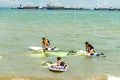 Singapore - June 15th 2019 : Man and women windsurfer windsurfing in the lagoon sea