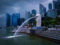 Singapore landmark Merlion with cloudy sky.