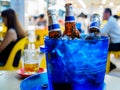 SINGAPORE - 17 MAR 2019 - Bottles of Tiger beer sit in a bucket of ice at a coffeeshop / kopitiam / hawker centre