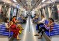 Singapore-21 MAR 2018: Passengers in a crowded Mass Rapid Transit subway train in Singapore city Royalty Free Stock Photo