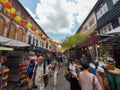 Singapore - 2016, March 27: Bustling street of Chinatown district. Singapore`s Chinatown is a world famous bargain shopping