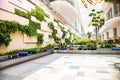 SINGAPORE, SINGAPORE - MARCH 2019: Luggage arriving among lush green plants in Changi Airport. Singapore Changi Airport, is the