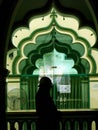 Man praying inside the Abdul Gafoor Mosque. Singapore