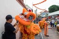 People in traditional costume perform the Chinese lion dance, Chinatown, Singapore Royalty Free Stock Photo