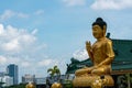 Statue Singapore Buddhist Youth Mission against view of Clementi
