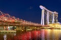 Singapore. Marina Bay Sands Hotel at sunset. Helix bridge