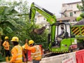 SINGAPORE - 3 MAY 2019 - Foreign Bangladeshi Indian construction workers at a road works site in Singapore