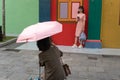 Singapore, Singapore - May 1, 2019 - Two unidentified women take photos in front on Tan Teng Niah former house on May 1,2019