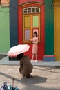 Singapore, Singapore - May 1, 2019 - Two unidentified women take photos in front on Tan Teng Niah former house on May 1,2019