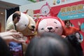 Singapore Mediacorp artistes Chen Hanwei and Zoe Tay with mascots for Lunar New Year of the dog Royalty Free Stock Photo