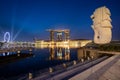 SINGAPORE - 27 12 2565 : Merlion fountain in front of the Marina Bay Sands hotel at night . Merlion is famous place as a symbol of Royalty Free Stock Photo