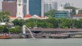 Singapore Merlion Park and Victoria Concert Hall with esplanade bridge timelapse