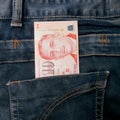 Singapore money bill in jean pocket Royalty Free Stock Photo