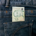 Singapore money bill in jean pocket Royalty Free Stock Photo