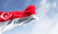 Singapore national flag waving in the wind on a clear day Royalty Free Stock Photo