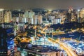 Aerial view of skyline business building and financial district from rooftop, Modern towers and skyscrapers illuminated at night Royalty Free Stock Photo