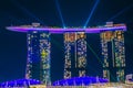 Beautiful laser show at Marina Bay Sands Hotel in night time is most popular for tourist and landmark center of Singapore