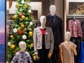 SINGAPORE - 17 NOV 2019 - A Christmas family fashion window display at a Marks & Spencer store Royalty Free Stock Photo