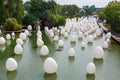 SINGAPORE-November 25, 2019: Installation of white eggs floating in water. Eggs are among seven interactive exhibits at GARDENS BY