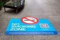 SINGAPORE-November 28, 2019: Sign no smoking zone on the sidewalk Orchard Road, Singapore