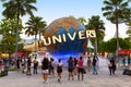 SINGAPORE-November 28, 2019: Tourists and theme park visitors taking pictures of the large globe in front of Universal Studios.