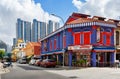 Singapore, Singapore - November 28, 2019: Traditional Singapore shophouses and modern apartment towers in historic Little India