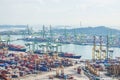View of a container terminal at the Port of Singapore. Cargo ships docked in harbor. Royalty Free Stock Photo
