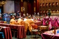 Buddhist monks in robes perform ceremony inside Buddha Tooth Relic Temple, Chinatown, Singapore Royalty Free Stock Photo