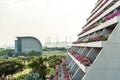 Modern block of flats with flower balconies in Asia