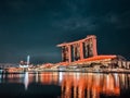 Landscape of the Marina Bay Sands surrounded by lights at night in Singapore Royalty Free Stock Photo