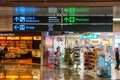 SINGAPORE - 08 OCT, 2013: Navigation signs and shops at Terminal