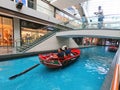 SINGAPORE - 12 October 2018: Canal and boat at The Shoppes at Marina Bay Sands Shopping Center in Singapore