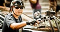 A biker wearing sunglass riding a black Harley Davidson bike