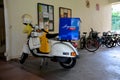 Singapore postman scooter with helmet