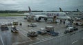 Singapore - 01.13.2018 - Qatar airways airplane boarding at the gate at rainy day in Changi Airport. Changi was ranked the world Royalty Free Stock Photo