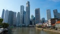 Boat Quay and skyscrapers in the financial district of Singapore Royalty Free Stock Photo