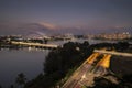 Singapore`s National Stadium and street lights at night