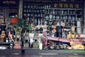 Shop front of vintage antique store that sells a treasure trove of old second hand furniture and homeware Royalty Free Stock Photo