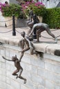 SINGAPORE, SINGAPORE - CIRCA SEPTEMBER 2015: Sculpture of boys jumping into the water, Singapore