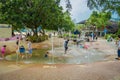 SINGAPORE, SINGAPORE - FEBRUARY 01, 2018: Beautiful outdoor view of children playing in the water with artificial