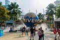 Singapore, Singapore - September 21, 2014:Tourists and the large rotating globe fountain in front of Universal Studios singapore